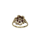 Gold ring with gemstones on a white background