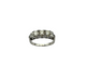 Silver ring with three diamonds on a white background