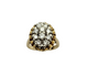 Gold ring with diamond cluster on a white background