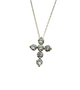 Gold cross-shaped necklace with clear stones on a white background