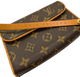 Louis Vuitton monogram handbag with brown strap on a white background