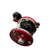 Red and black mechanical component on a white background