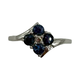 10K White Gold Sapphire Flower w/ Diamond Accent Bypass Ring Silver ring with blue gemstones on a white background
