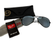 Ray-Ban sunglasses with black case and packaging on a white background