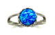 .925 Sterling Silver Bezel Set Blue Opal Heart Cutout Split Ring Silver ring with a blue opal stone on a white background