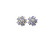 Pair of flower-shaped earrings with purple and clear gemstones on a white background