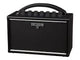 Black Boss amplifier with a handle on a white background