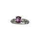 Silver ring with a pink gemstone on a white background