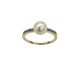 Gold ring with a pearl and small diamonds on a white background