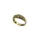 Gold ring with diamonds on a white background