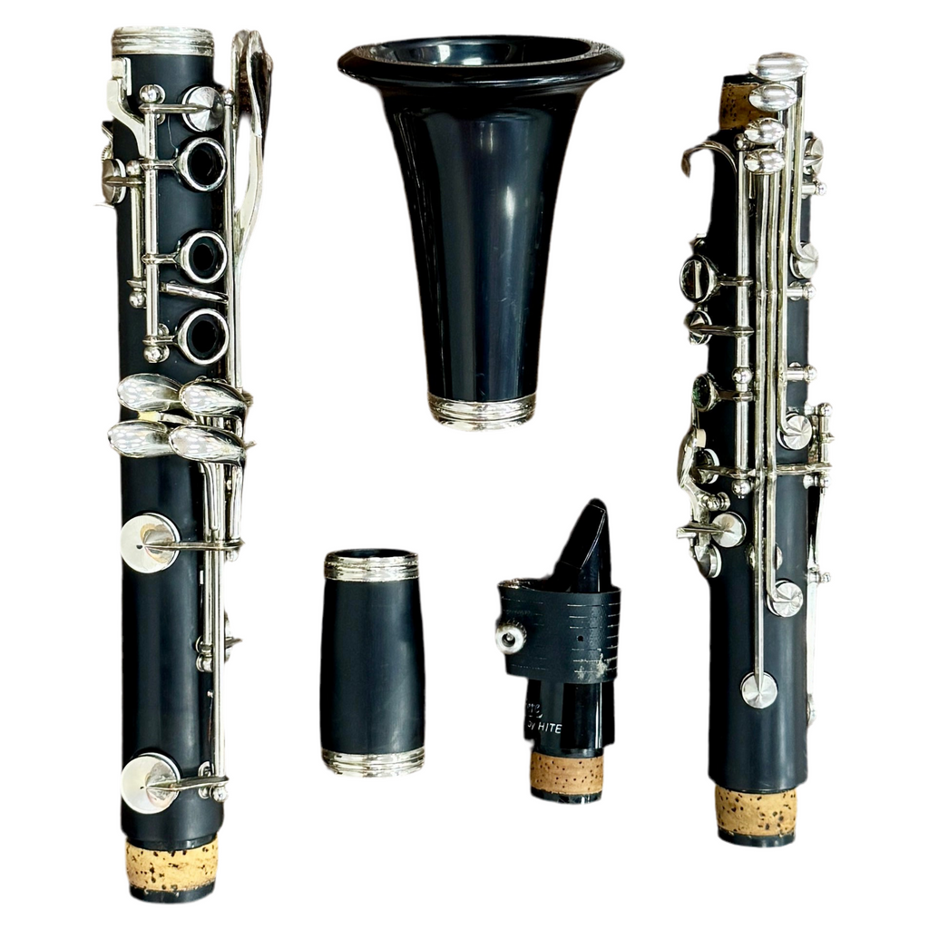 Buffet Crampon Prodige Student Model Bb Clarinet w/ Hard Case Clarinet parts including black body, silver keys, and cork on a white background