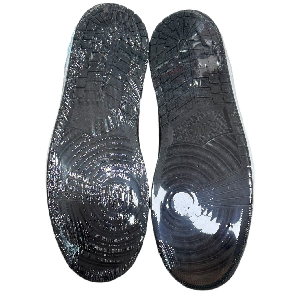 Jordan 1 Low - White Toe (Size 12) Black shoe sole with tread pattern on a white background