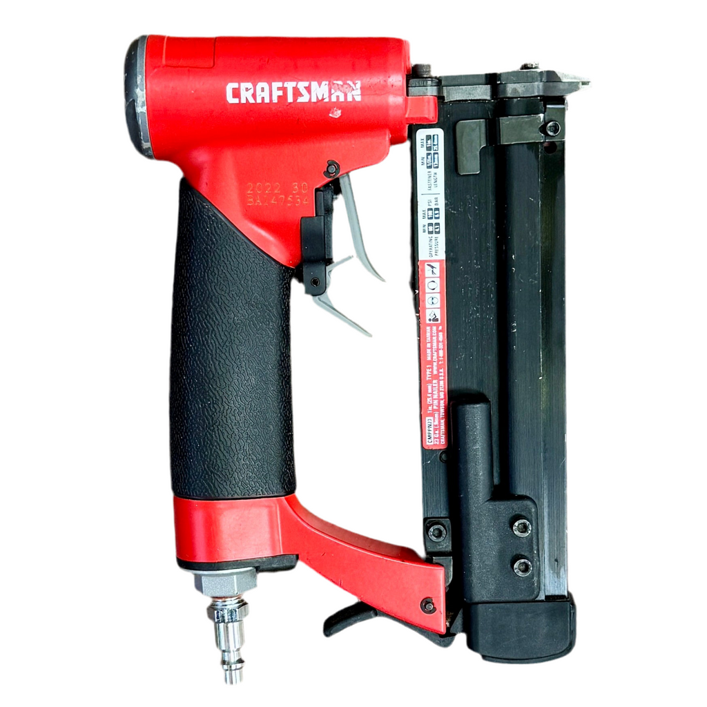 CRAFTSMAN 23-Gauge 1" Pneumatic Pin Nailer (CMPPN23) Red and black Craftsman nail gun on a white background