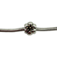 Pandora .925 Sterling Silver/14K Gold Flower Charm Silver charm with a flower design on a white background