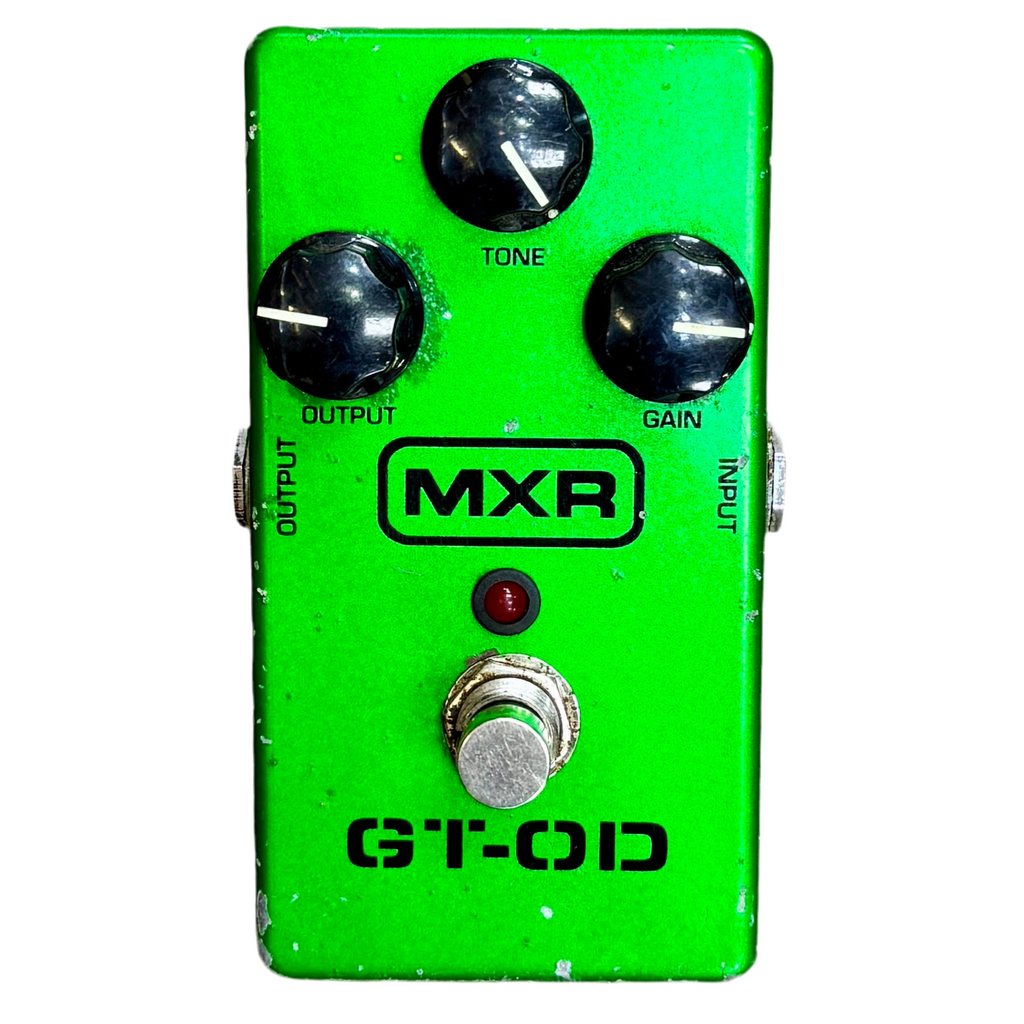 Green guitar effects pedal with MXR branding on a white background