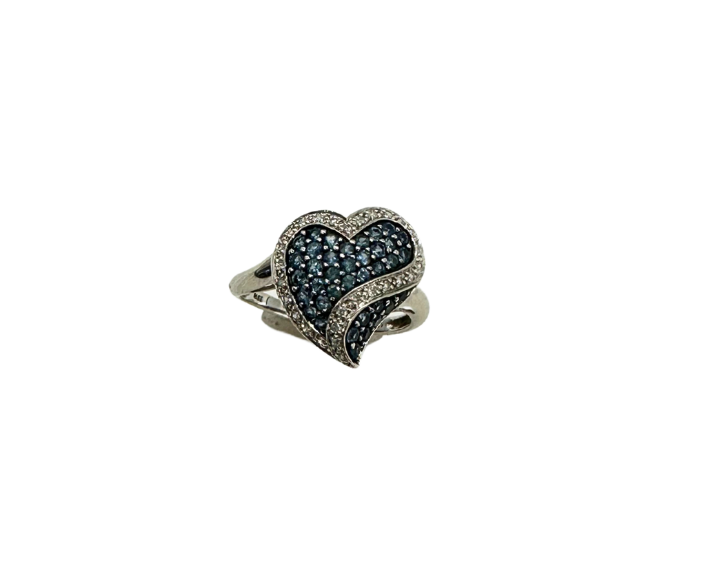 Heart-shaped ring with blue gemstones on a white background
