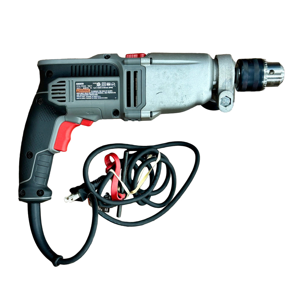 Porter-Cable 7-Amp 1/2" Corded VSR 2-Speed Hammer Drill (PC70THD) Electric drill with cord on a wooden floor