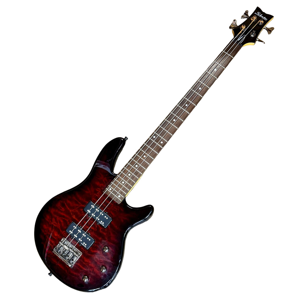 Schecter Diamond Series RAIDEN SPECIAL-4 Electric Bass Guitar (Missing 1st String) Electric bass guitar on a wooden floor