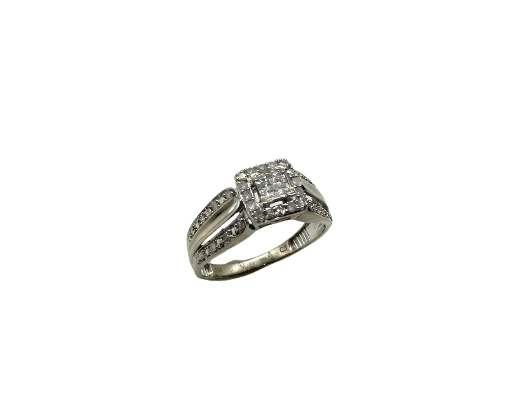 Silver ring with gemstones on a white background