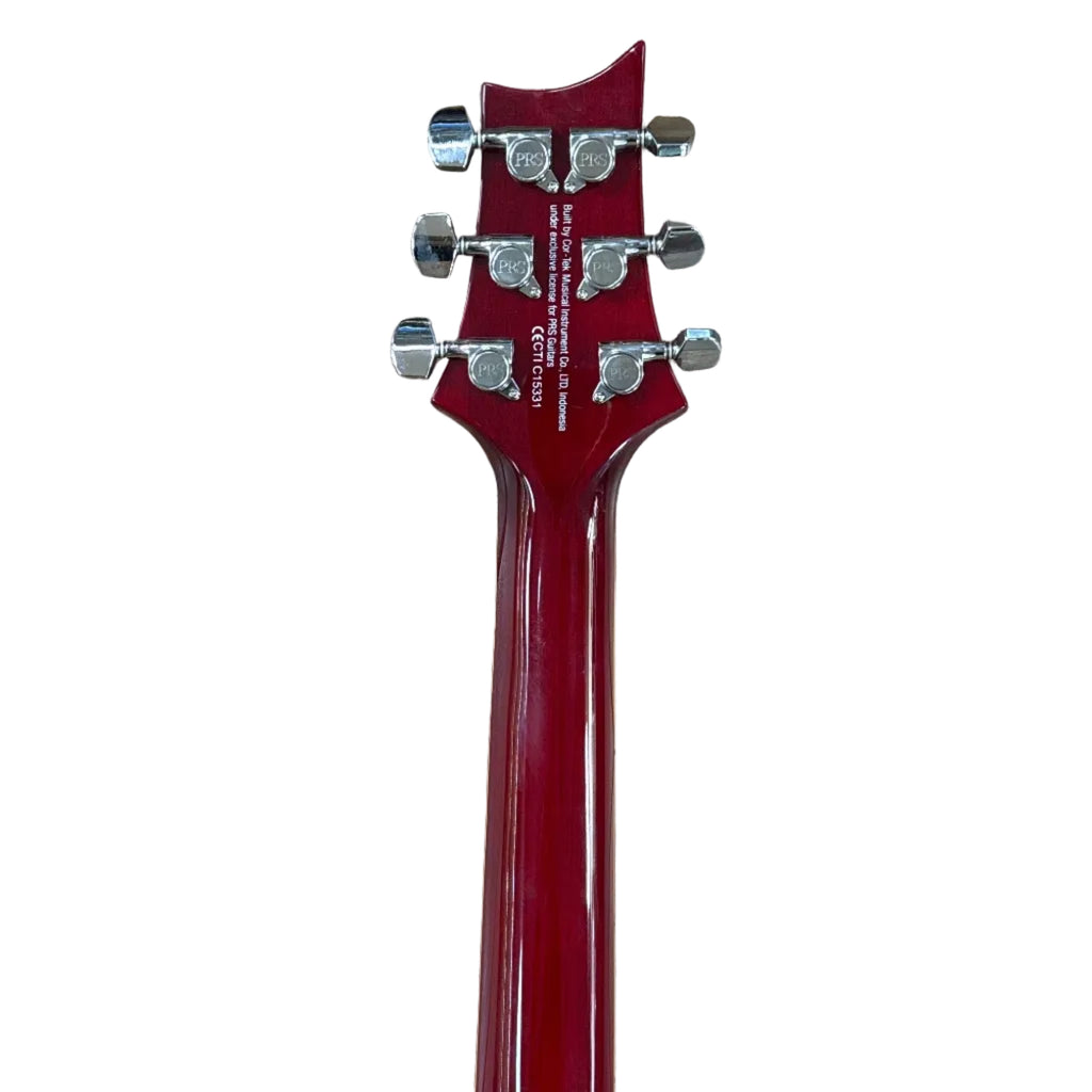 PRS Paul Reed Smith SE Standard ST4VC Electric Guitar w/ Soft Case Close-up of a red electric guitar's headstock on a white background