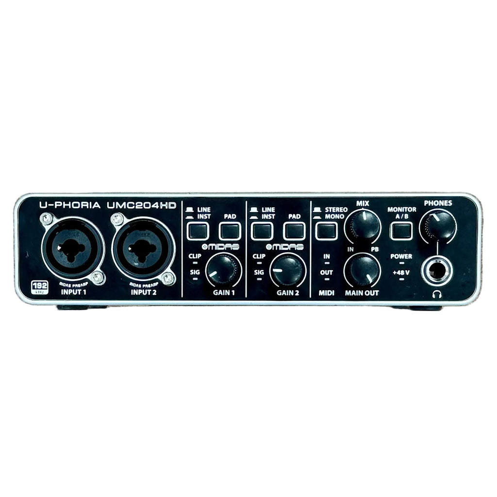 Behringer U-PHORIA UMC204HD USB Audio Interface Audio interface on a wooden surface