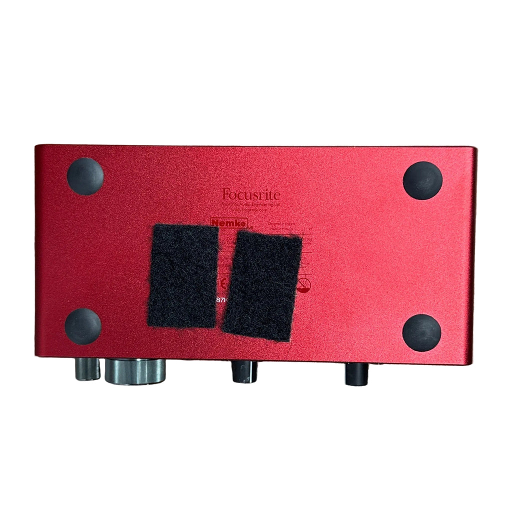 Focusrite Scarlett 2i2 3rd Gen USB Audio Interface Red electronic device with black components on a wooden surface