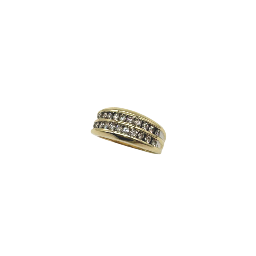 Gold ring with embedded diamonds on a white background