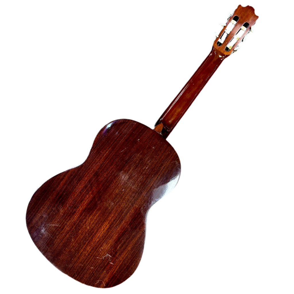 Wooden ukulele on a white background