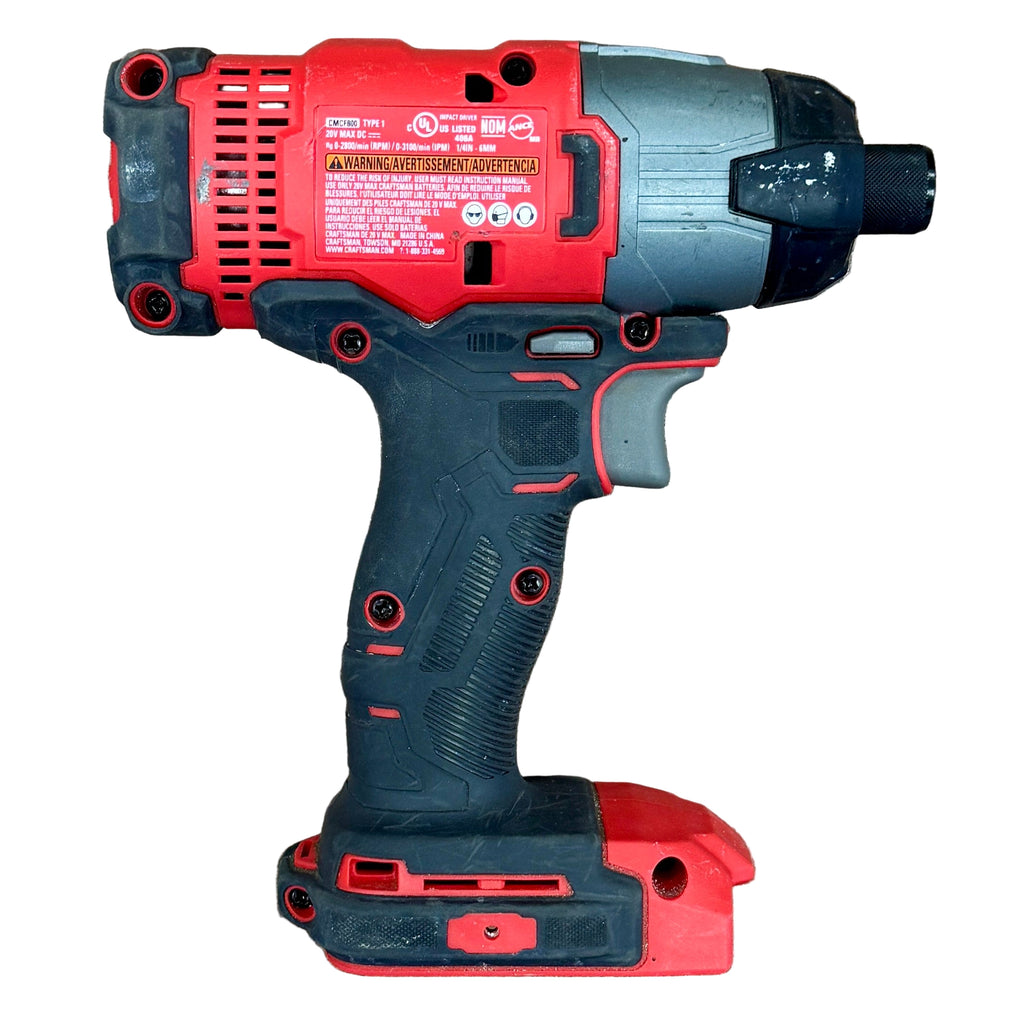 CRAFTSMAN V20 1/4" Cordless Variable Speed Impact Driver w/ Battery & Charger (CMCF800) Red and black cordless drill on a wooden surface