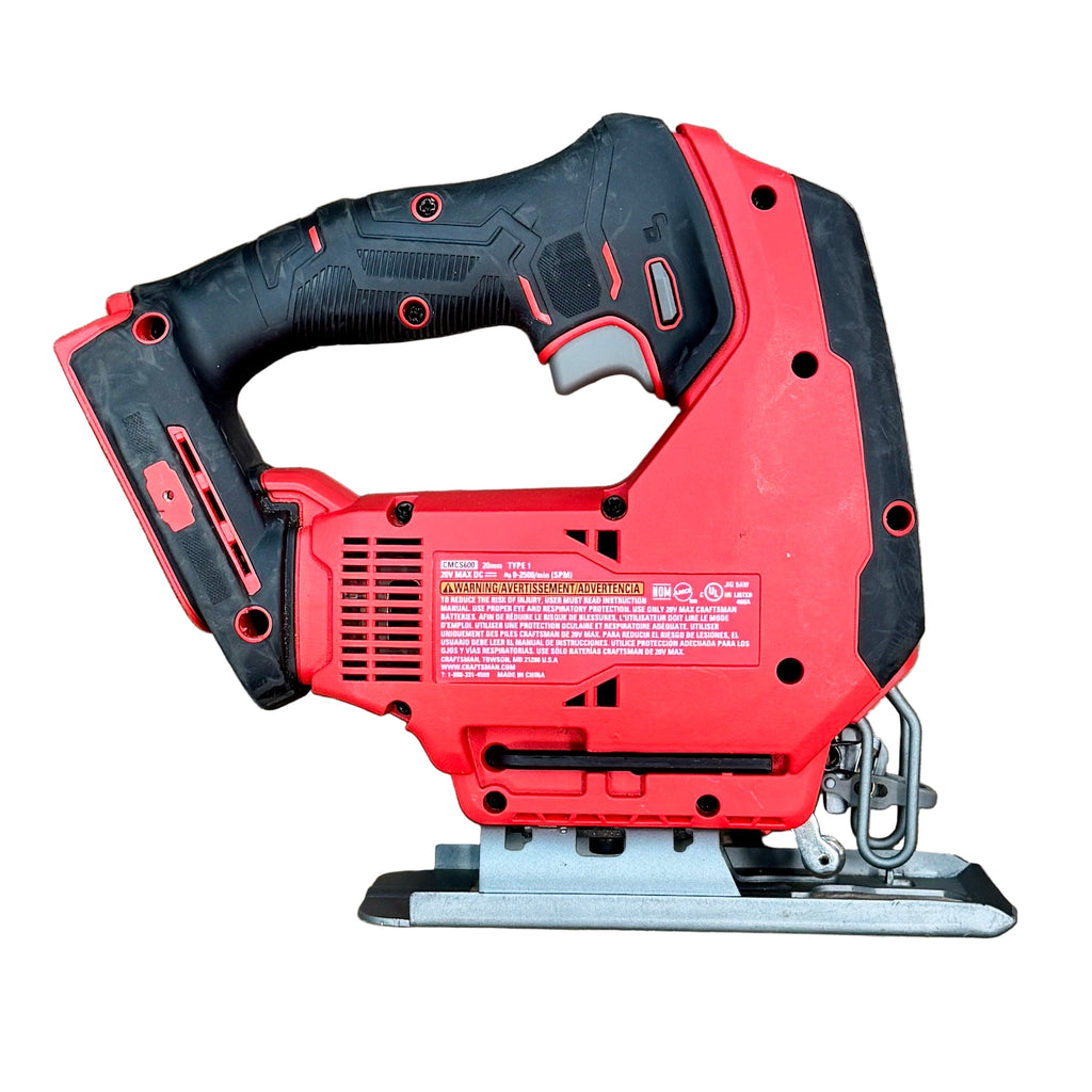 CRAFTSMAN V20 Cordless Variable Speed Jig Saw (CMCS600) Red and black jigsaw on a wooden surface