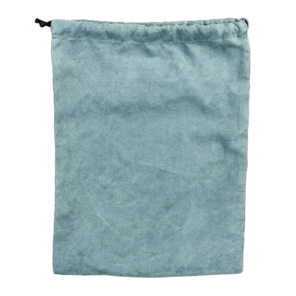 JBL Live 770NC Wireless Noise Cancelling Over-Ear Headphones - White Blue drawstring bag on a wooden surface