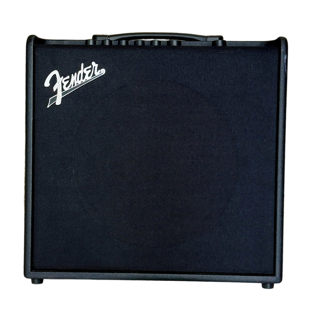 Fender MUSTANG LT50 Guitar Combo Amplifier Fender guitar amplifier on a wooden floor with a person's feet visible