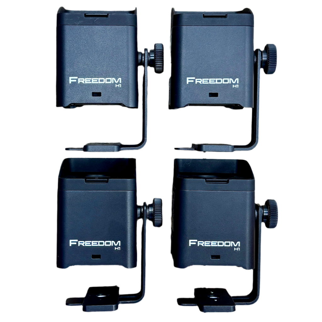 Chauvet DJ Freedom H1 Wash Lights (4) w/ Remote & Case Four black 'Freedom H1' phone holders on a white background