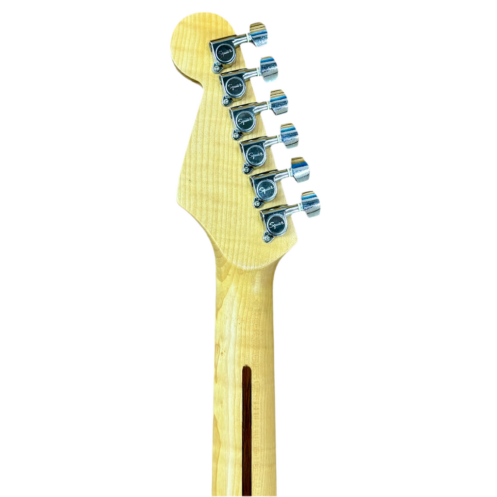 Fender Squier Stratocaster Electric Guitar w/ Hard Case Close-up of a guitar neck with tuning pegs on a white background