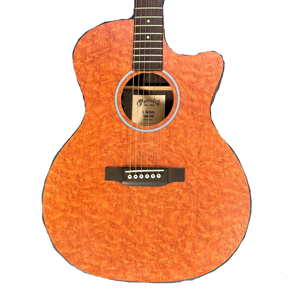 Martin X Series Special Acoustic-Electric Guitar w/ Soft Case Acoustic guitar on a blue textured surface