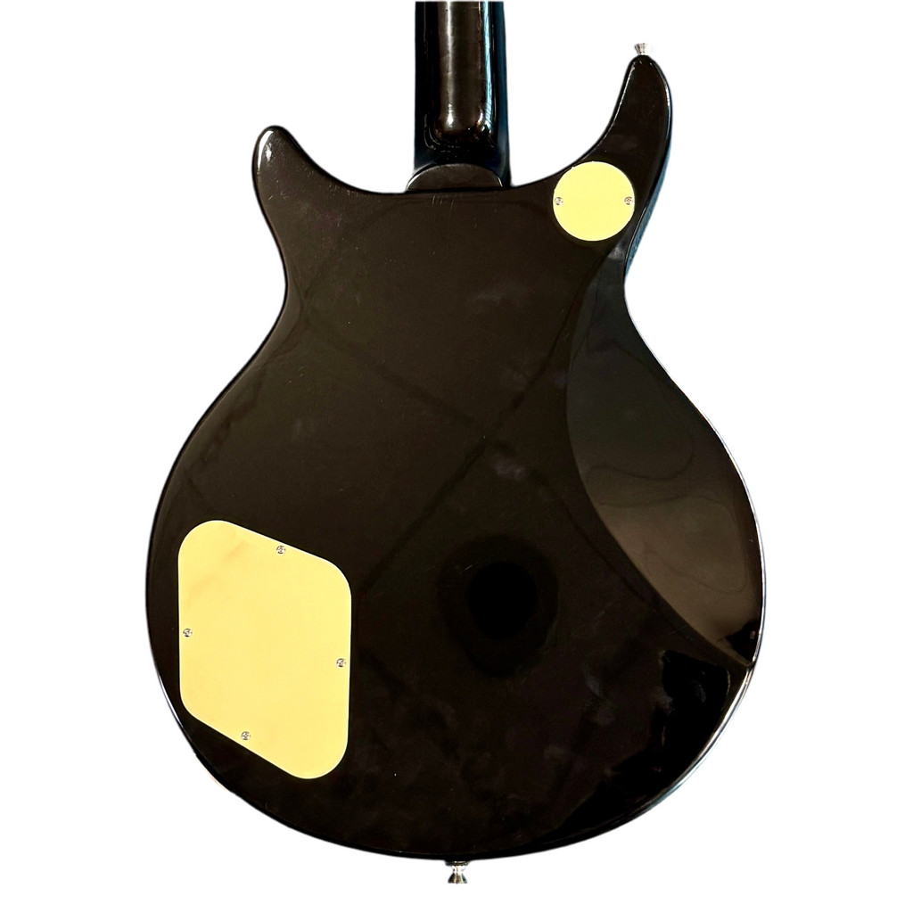 Epiphone DC PRO Electric Guitar Close-up of a black electric guitar with yellow pickguard on a white background