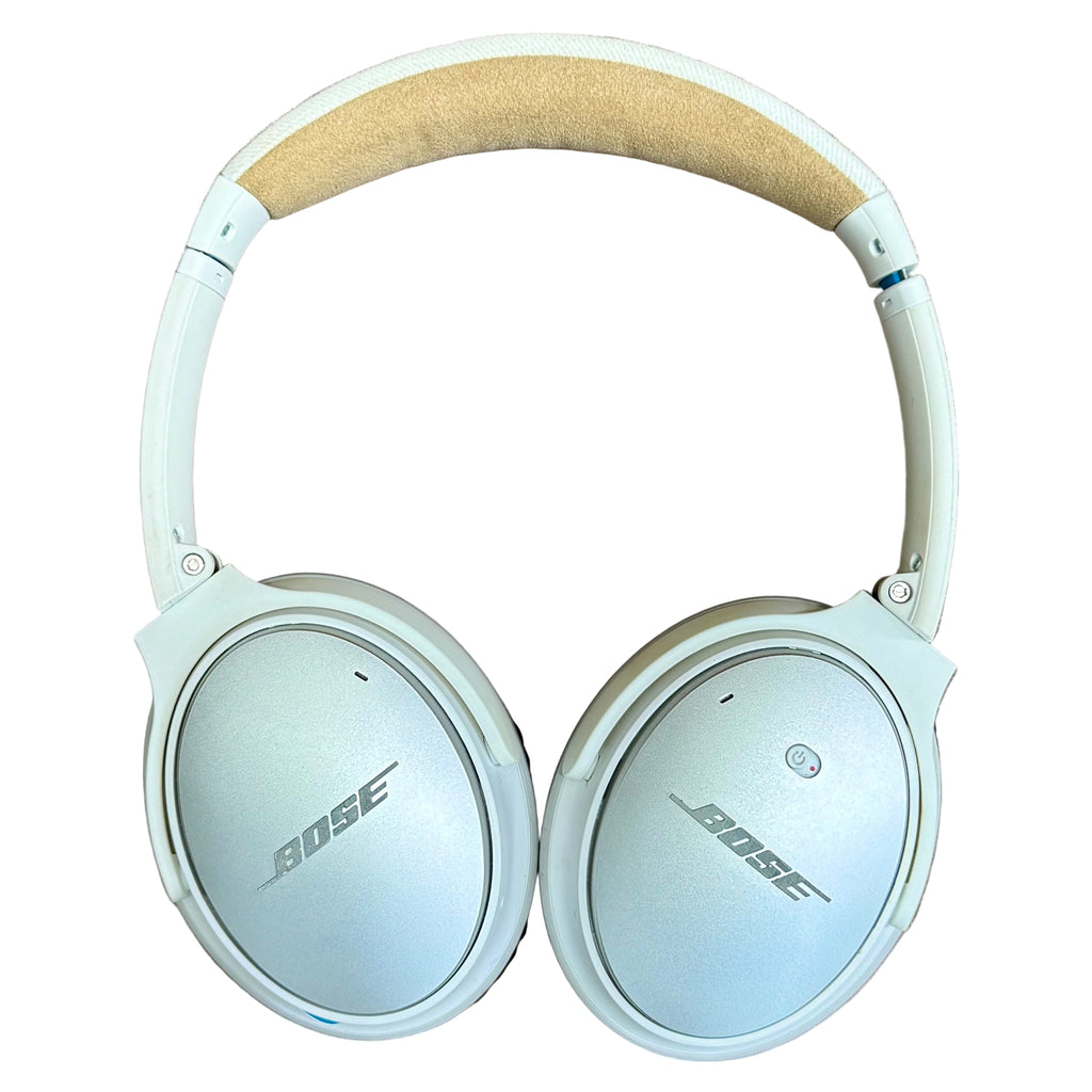 BOSE QuietComfort 25 Acoustic Noise Cancelling Headphones w/ Case - White Bose headphones on a wooden surface