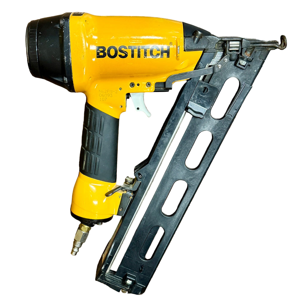 BOSTITCH 15-Gauge 2-1/2" Pneumatic Angled Finish Nailer w/ Hard Case (N62FN-2) Bostitch nail gun on a wooden surface