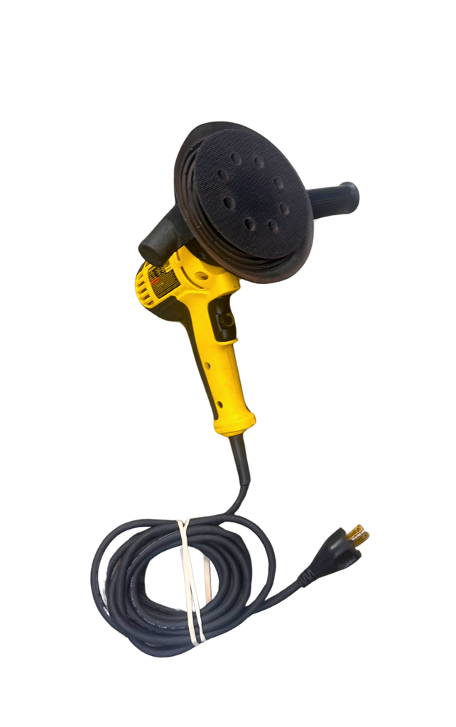Yellow power sander with black sanding disc on a white background