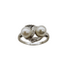 Silver ring with two pearls on a white background