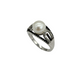 Silver ring with a pearl and small diamonds on a white background