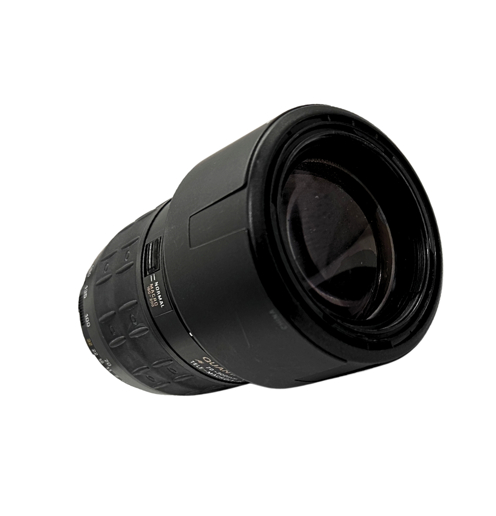 Black camera lens on a white background