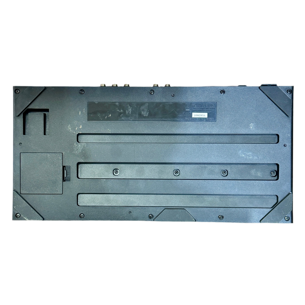 BOSS ME-90 Guitar Multiple Effects Processor Pedal Rectangular metal component with various slots and connectors on a white background