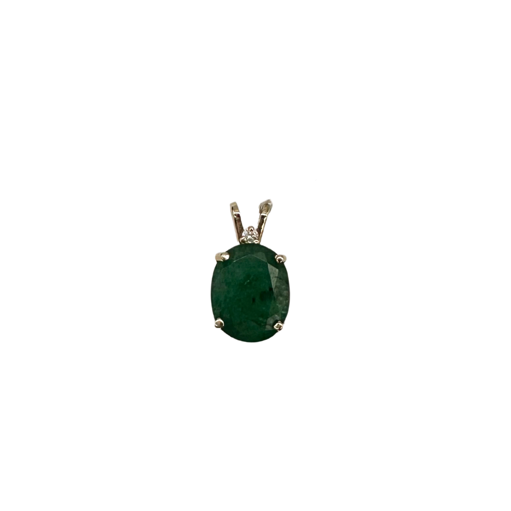 Green gemstone pendant with gold setting on a white background