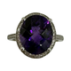 14K White Gold 1/2CTW Diamond Oval Amethyst Halo Ring Ring with a large purple gemstone and silver accents on a white background