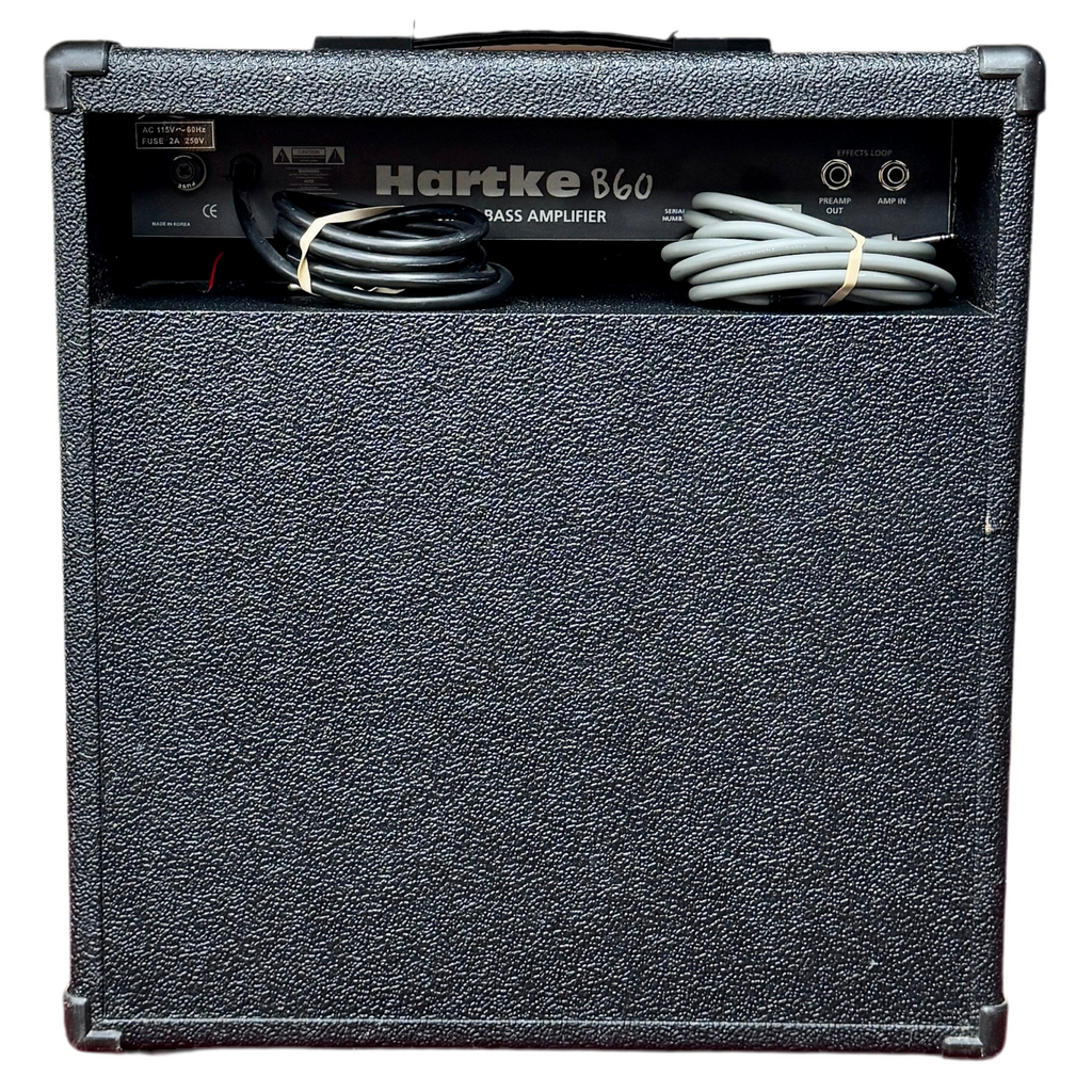Hartke B60 Bass Guitar Combo Amplifier Hartke bass amplifier with cables on a white background