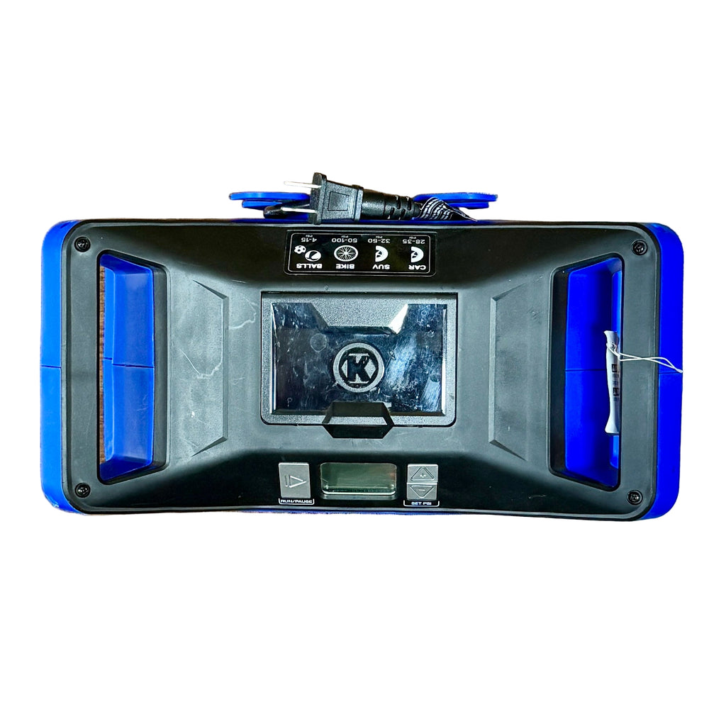 Kobalt 1.5-Amp 12V / 120V Portable Air Compressor Inflator (KLDP1) Black and blue electronic device with a brand logo on a wooden surface