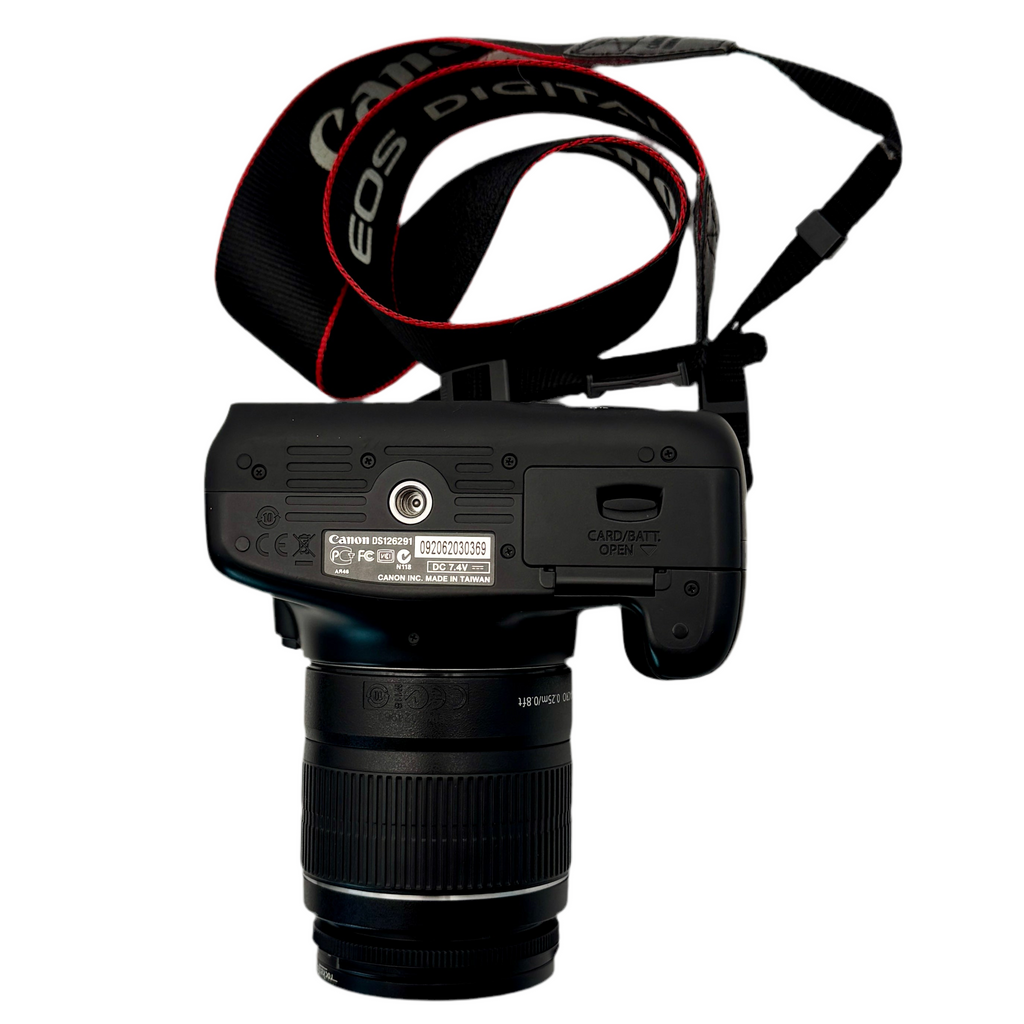 Canon EOS Rebel T3 12.2 MP CMOS Digital SLR Camera w/ Canon Zoom Lens EF-S 18-55mm f/3.5-5.6 IS II & Canon Zoom Lens EF 75-300mm f/4-5.6 III Lenses Black Canon camera with lens cap on a white background