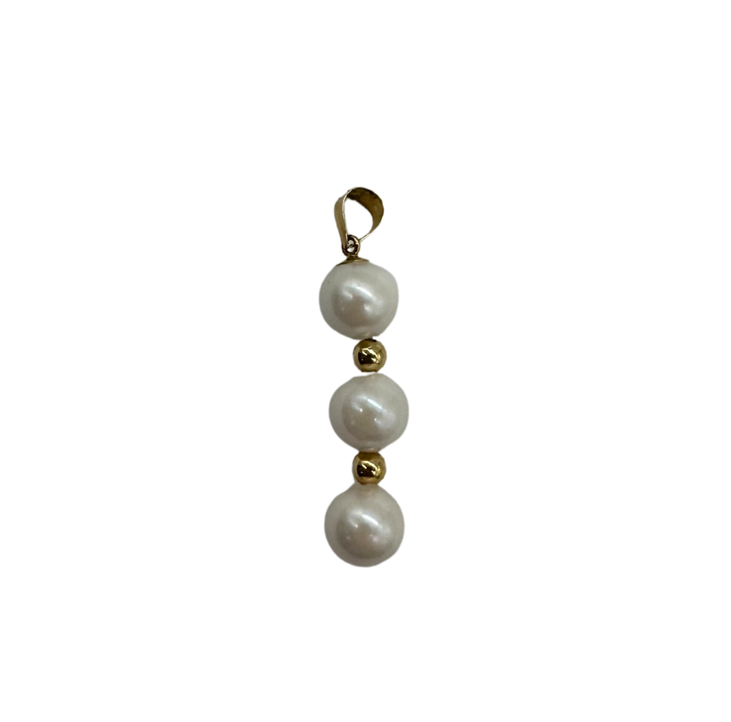 Pearl pendant with gold accents on a white background