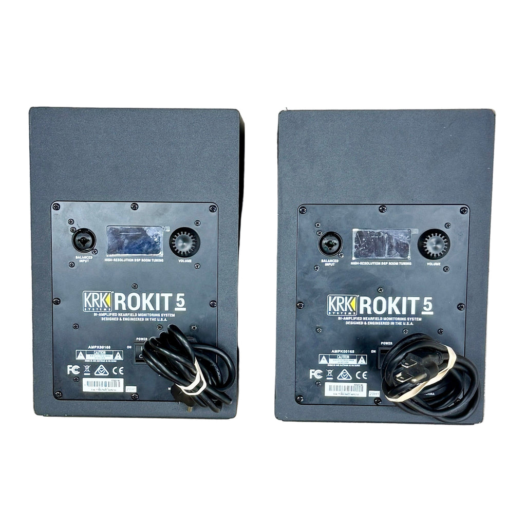KRK SYSTEMS ROKIT 5 G4 Professional Bi-Amplified 5" Powered Studio Monitors (Pair) Two KRK Rokit 5 speakers on a wooden floor